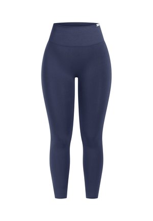 Leggings de talle alto en color marino, confeccionados con una tela suave y elástica. Presentan un diseño ajustado sin patrones ni detalles metálicos.