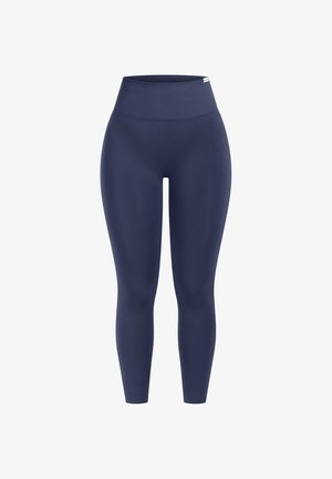 Leggings taille haute bleu marine fabriqués en tissu lisse et extensible. Présente un design ajusté sans motifs ni accents métalliques.