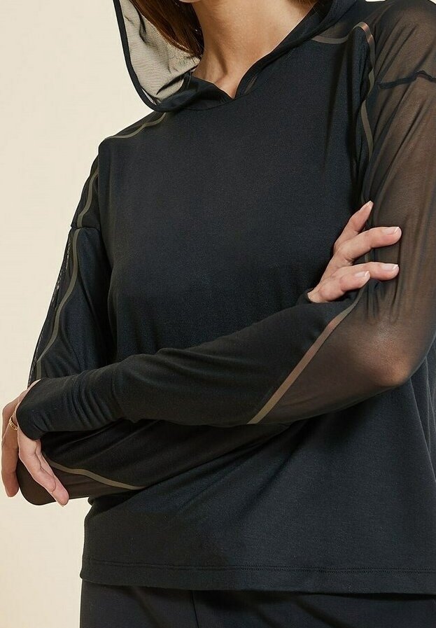 Black hooded top with sheer mesh long sleeves, featuring a fitted design and subtle sheen. Smooth texture with a layered appearance.