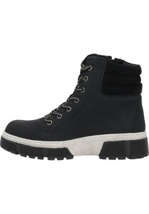 Black ankle boots with a smooth upper, padded collar, and contrasting white sole. Features metal eyelets and round laces. Textured rubber sole.
