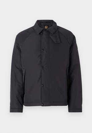 Black, padded jacket with a collared neckline, snap buttons, and side pockets. Features raglan sleeves and a smooth, matte texture.