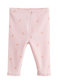 Roosa puuvillased retuusid mustrilise kujundusega, millel on väikesed lillemustrid. Nendel on pehme tekstuur ja pahkluude juures volditud ääred.