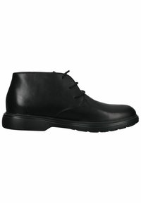 Bottines en cuir noir à bout rond, texture lisse, quatre œillets et semelle en caoutchouc. Design classique avec des accents minimalistes.