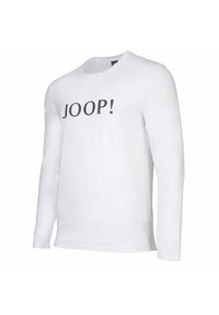 Pitkähihaisesta valkoisesta puuvillapaidasta, jossa on pyöreä pääntie ja harmaa "JOOP!" -teksti painettuna etuosaan. Sujuva rakenne, rento muotoilu.