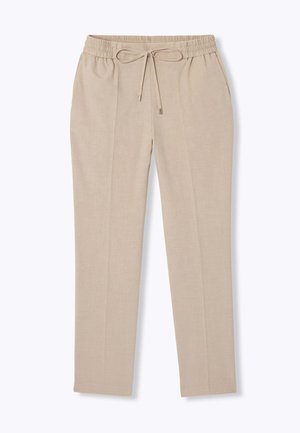 Pantalons beige clair avec une taille élastique et un cordon de serrage ajustable. Texture lisse avec une coupe ajustée et sans poches visibles.