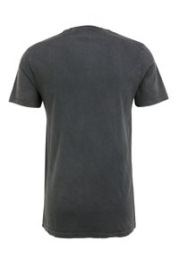 M�ørkegrå bomulds T-shirt med rund hals, korte ærmer og et enkelt design, der har en blød tekstur og en falmet finish.