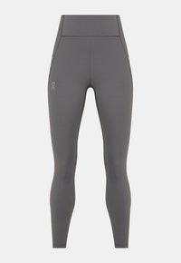 Leggings gris foncé taille haute et longueur complète avec un logo discret sur la cuisse gauche, présentés sur un fond blanc.