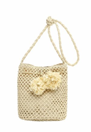 Beige woven shoulder bag with braided strap and two fabric flower decorations on the front, designed for casual use.