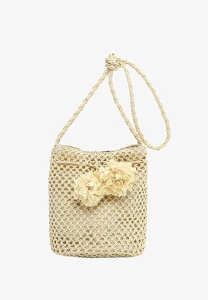 Beige woven shoulder bag with braided strap and two fabric flower decorations on the front, designed for casual use.