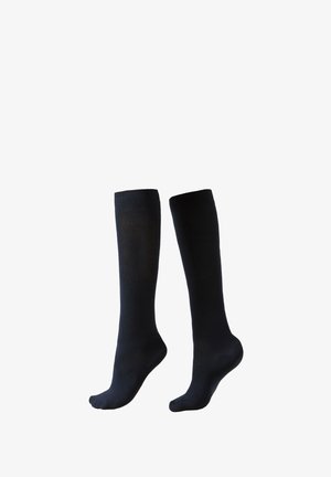 Zwarte kniekousen gemaakt van een gladde, rekbare stof. Voorzien van een geribbelde boord aan de bovenkant en een naadloos teenontwerp.