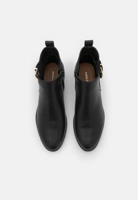 Anna Field Tronchetti - black