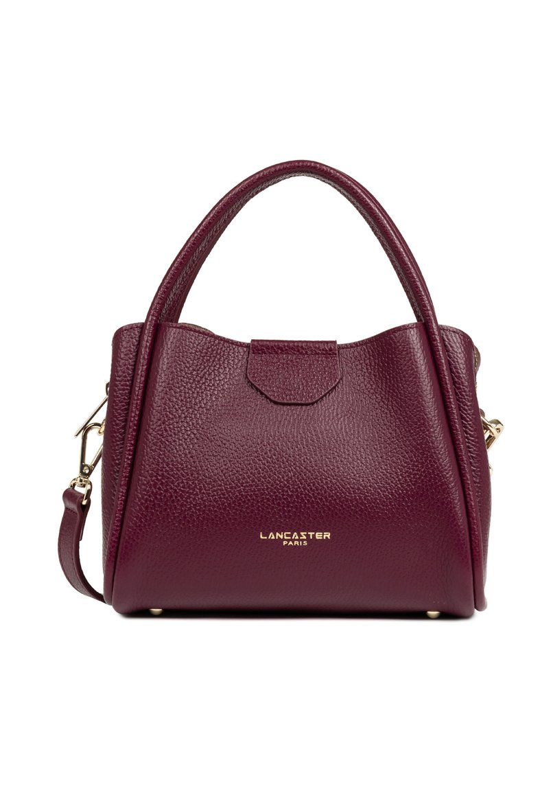 Sac à main en cuir bordeaux avec une finition texturée, deux poignées rondes, une bandoulière amovible et des accents en métal doré. Présente le logo de la marque à l'avant.