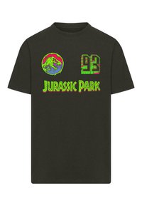 T-shirt en coton noir avec un graphique vibrant en vert, rose et bleu représentant un dinosaure et le texte "Jurassic Park", avec "93" sur le côté.