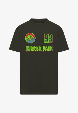T-shirt en coton noir avec un graphique vibrant en vert, rose et bleu représentant un dinosaure et le texte "Jurassic Park", avec "93" sur le côté.