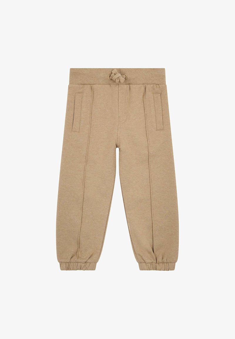 Beige sweatpants with a drawstring waistband, elastic cuffs, and side pockets, made of soft fabric with a smooth texture.