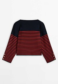 Navy and red striped sweater with a boat neckline, ribbed texture, and long sleeves featuring gold button accents at the cuffs.