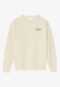 Felpa beige realizzata in tessuto morbido, con colletto rotondo, maniche lunghe e un design di testo ricamato verde sulla parte superiore sinistra.