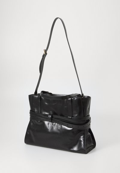 Black leather handbag with a shiny finish, featuring a structured body, adjustable shoulder strap, and a belted accent across the middle.