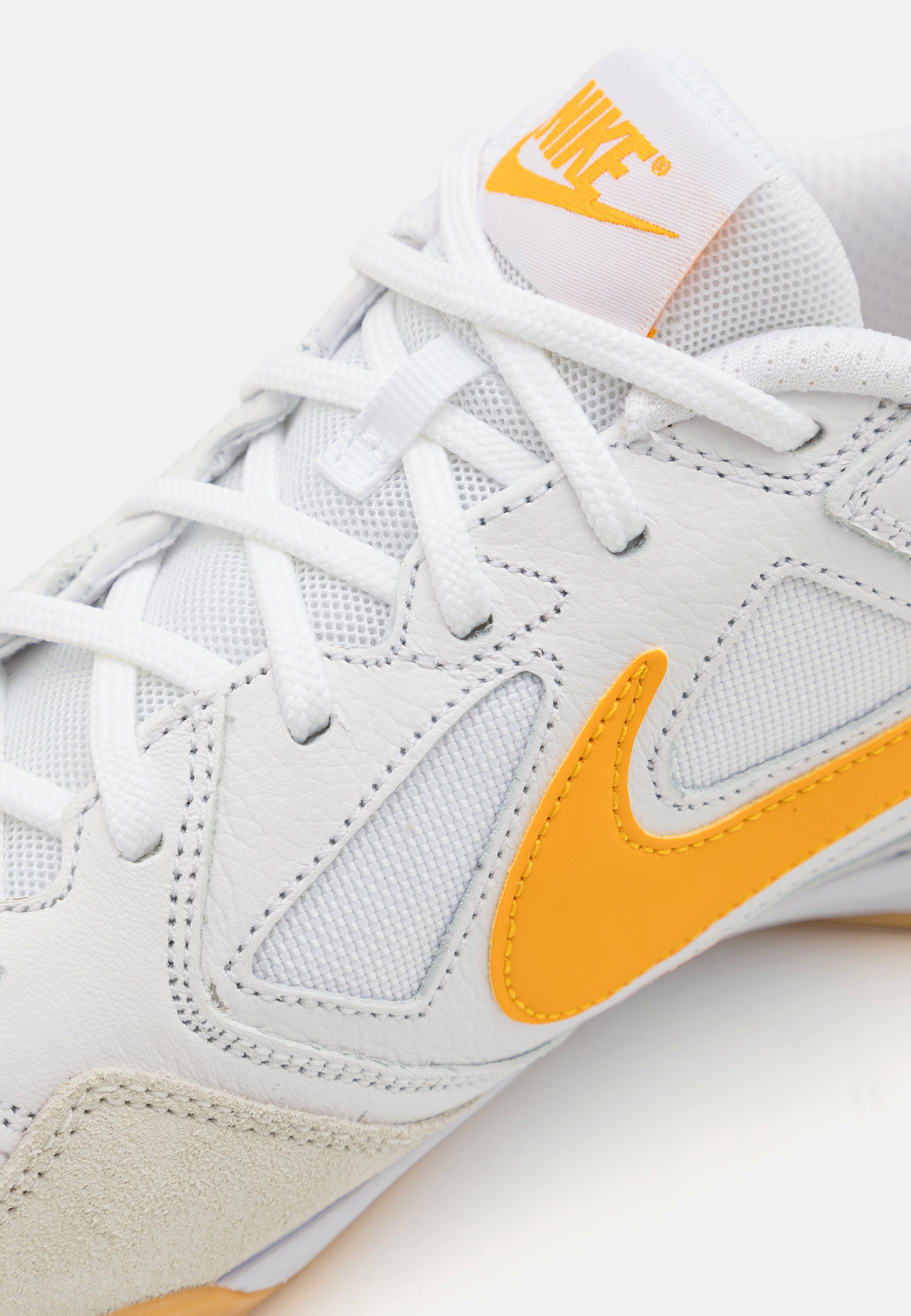 nike gato white gold