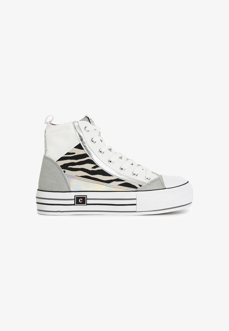 High-top sneaker featuring a white canvas upper, silver accents, black and white zebra print, grey side panels, and a textured white sole.