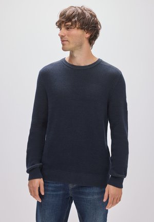 - Sweter