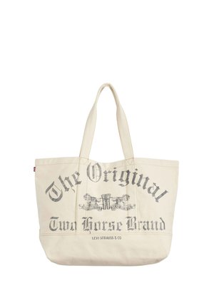 Beige lærredstaske med teksten "The Original Two Horse Brand" og Levi Strauss & Co.-logo trykt i gråt, med to heste, der trækker jeans.