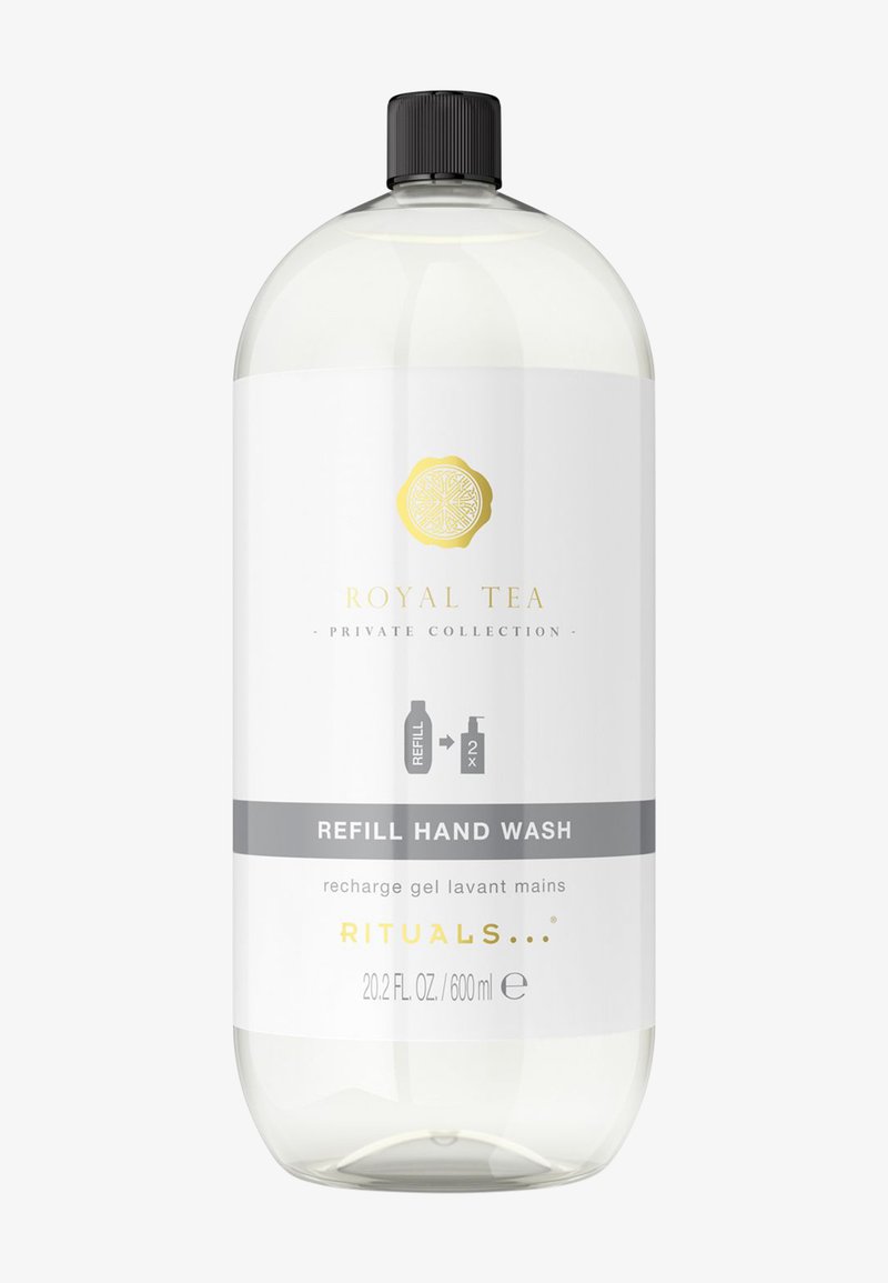 Bouteille en plastique transparente de savon pour les mains rechargeable, avec un bouchon noir, des accents dorés et gris, et une étiquette blanche comportant du texte produit et des icônes.