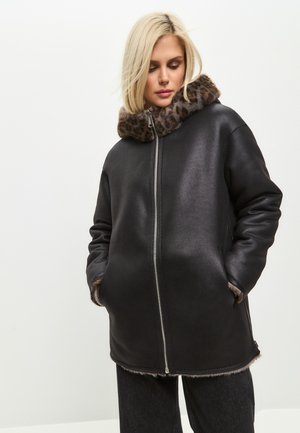 REVERSIBLE - Wintermantel - black