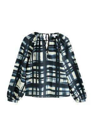 Garām piedurknēm blūze tumši zilā un krēmkrāsā ar pleda rakstu. Izgatavota no viegla auduma ar sapulcinātu kakla izgriezumu un aukliņu detaļu.