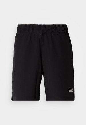 Svarte atletiske shorts laget av lett stoff, med elastisk midjebånd og en liten logo på nedre høyre side.