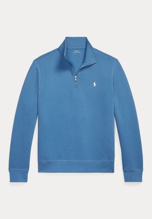 Hellblauer Pullover mit Viertel-Reißverschluss aus weicher Baumwollmischung, mit gerippten Bündchen und Saum sowie einem kleinen gestickten Logo auf der Brust.