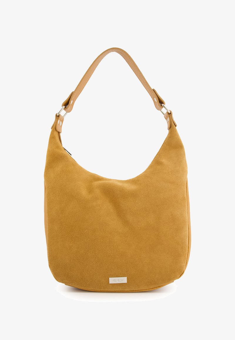 Suede hobo bag in mustard yellow with a leather shoulder strap, silver hardware, and a smooth texture. Notable brand plaque on the front.