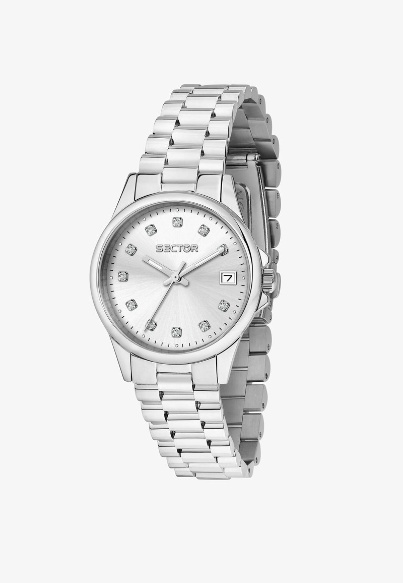 Orologio in metallo argentato con finitura lucida, quadrante rotondo, dettagli in cristallo e finestra per la data. Presenta un cinturino a bracciale con maglie collegate.