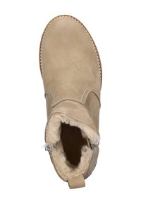 Beige suède enkellaars met een zachte bontvoering, een ronde neus, gestikte details en een achterste lipje voor gemakkelijke instap.