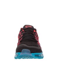 Nike black running shoe with pink accents, textured mesh upper, and turquoise translucent sole. Features lace-up closure and padded collar.
