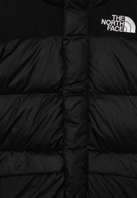 The North Face HMLYN - Jakna ispunjena paperjem - black