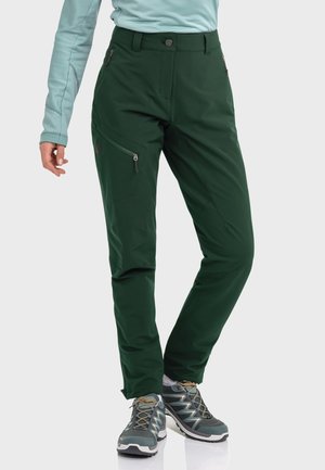 Green softshell pants with a fitted design, zippered side pockets, and a front button closure. Material appears durable and water-resistant.
