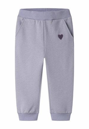 Pantalon de jogging violet clair pour tout-petit avec taille et poignets élastiques, poches latérales et petit motif cœur sombre sur la cuisse gauche.