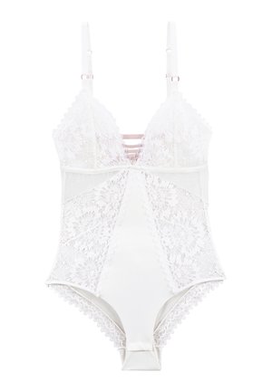Bodysuit en dentelle blanche avec des panneaux en satin doux, des bretelles ajustables, des bords festonnés et des motifs floraux complexes. Présente un décolleté en U.