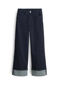 Jeans a gamba larga in denim blu scuro con vita alta, dotati di orli arrotolati in un tessuto blu più chiaro e design standard a quattro tasche.