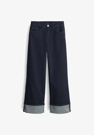 Dunkelblaue Denim-Jeans mit weitem Bein und hoher Taille, mit umgeschlagenen Säumen in einem helleren Blauton und klassischem Vier-Taschen-Design.