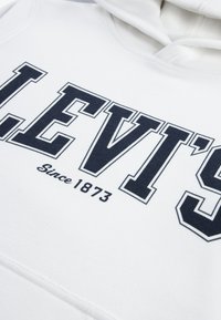 Levi's® THE GREAT HIGHWAY HOODIE - Ikdienas džemperis - blanc de blanc