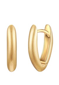 Zelta auskari ar gludu, nedaudz teksturētu virsmu, izliekta forma un sprādze, izceļoties ar spīdīgu, metālisku mirdzumu.