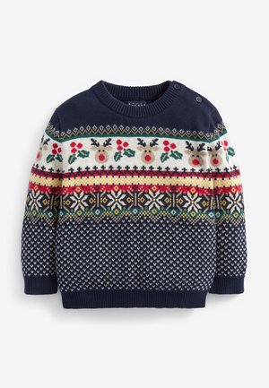 Granatowy sweter z dzianiny z wzorami reniferów, ostrokrzewu, płatków śniegu i geometrycznymi w kolorach czerwonym, białym, zielonym i żółtym, z guzikami na ramionach.
