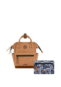 Tan backpack with zipper closures, front pockets, and top handles. Includes a patterned navy pouch featuring white tropical leaves.