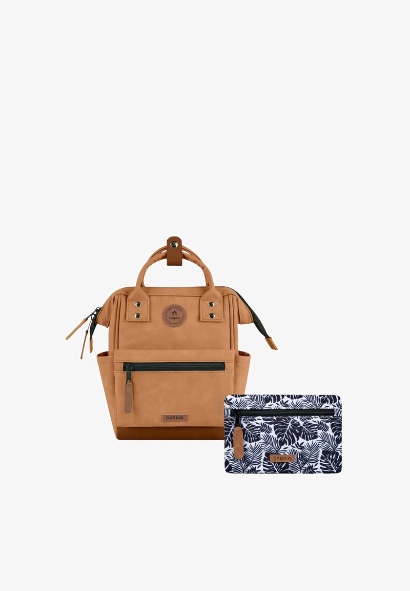 Tan backpack with zipper closures, front pockets, and top handles. Includes a patterned navy pouch featuring white tropical leaves.