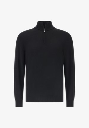 Melna adīta džemperis ar pusi rāvējslēdzēja apkakli, garām piedurknēm, kā arī ribotas aproces un apakšmalu. Gluda tekstūra bez rakstiem vai akcentiem.