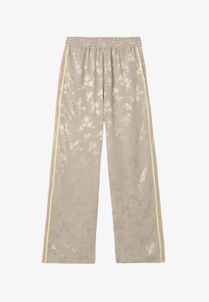 Pantalon beige à jambes larges avec un motif floral subtil, taille élastique et double bande latérale pastel en tons jaunes et pêche.
