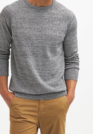 Stickad tröja - black