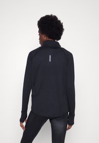 Nike Performance Long sleeved top - black
